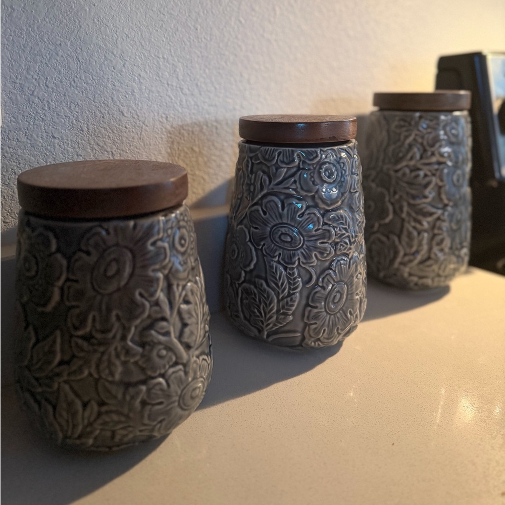 Pier 1 Floral Embossed Canisters with Brown Lids